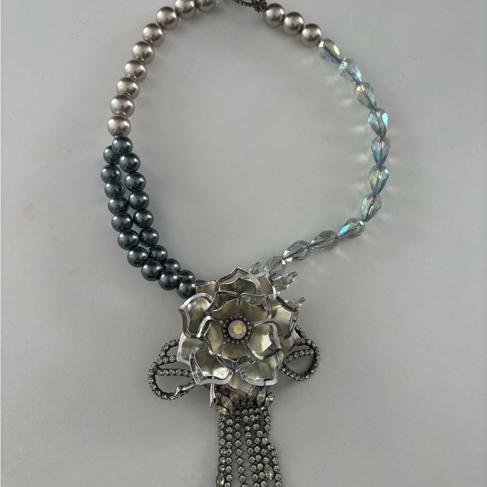 Elegant Silver and Gray Necklace with Beaded Strand and Ornate Centerpiece